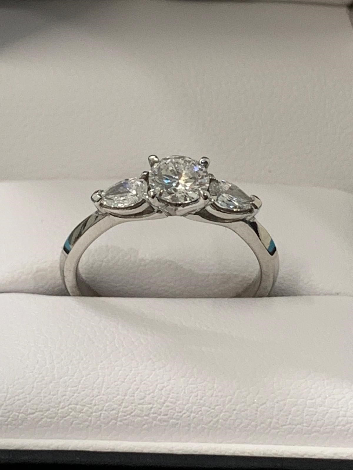 PRE LOVED 18K WG DIA TRILOGY RING TDW= 0.80CT